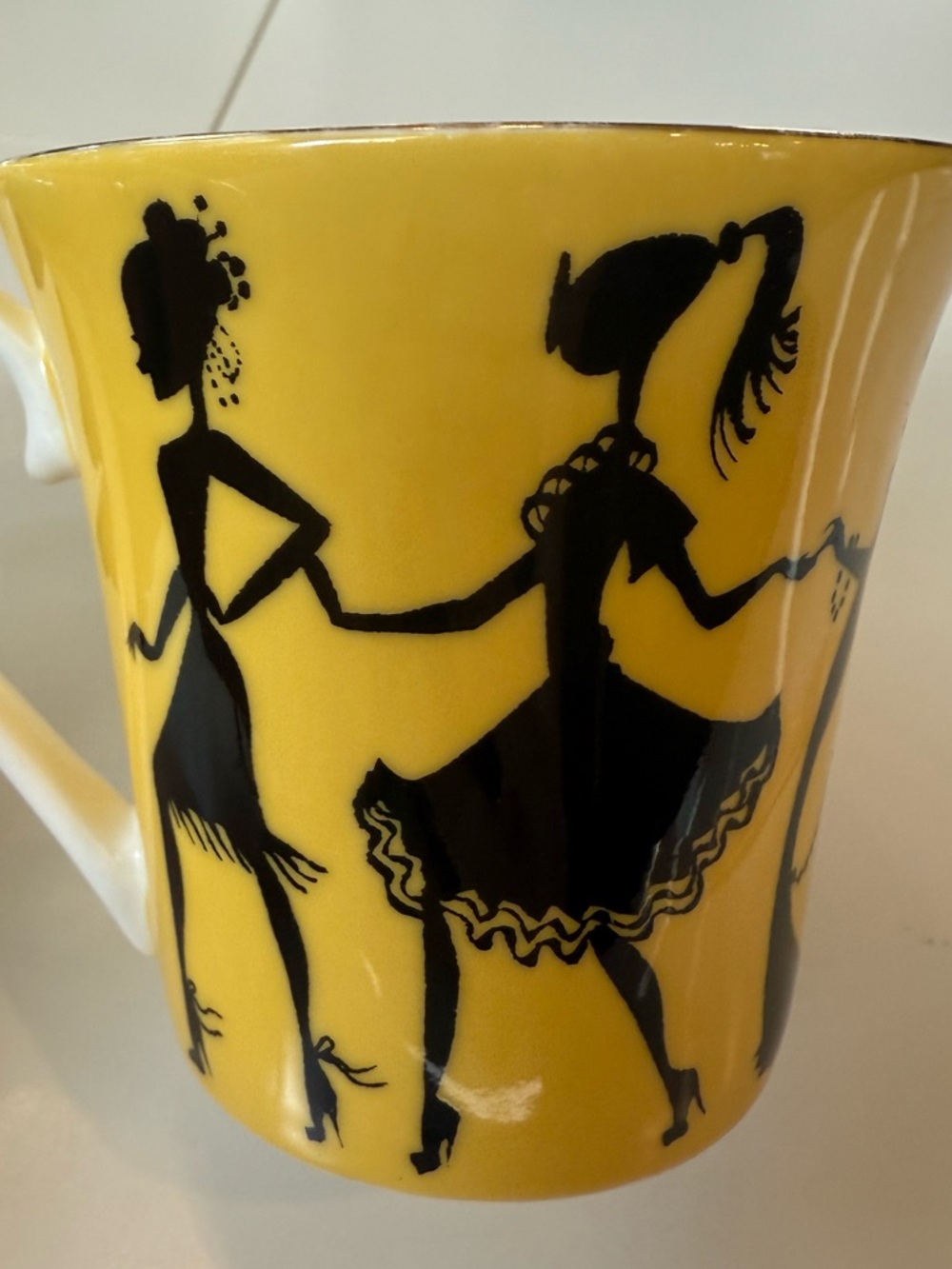 R Toledo  Nordstrom Yellow Ceramic cup Mug with Black Silhouettes gold trim
